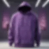 A stylish purple graphic hoodie displayed on a mannequin featuring modern patterns